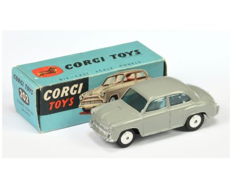 Corgi Toys 202 Morris Cowley Saloon - Grey body, silver trim, flat spun hubs - Good Plus bright example in a Good blue carded