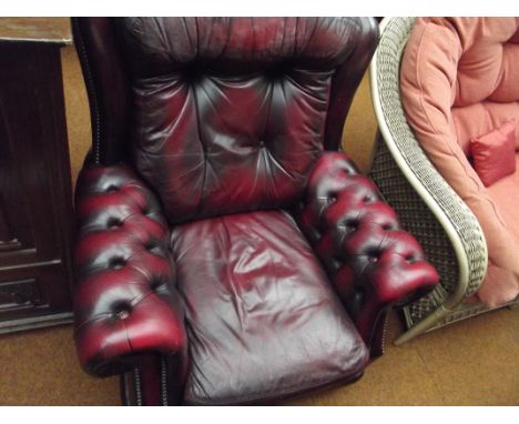Deep button leather chair in oxblood 