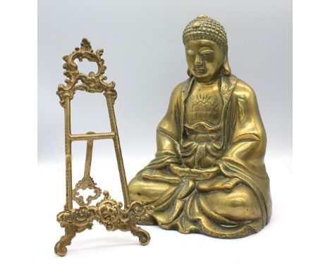 Late 19th/early 20th Century bronze seated Buddha, 25cm high along with a brass easel picture stand.