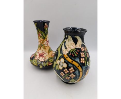 2 Moorcroft vases consisting of a vase in the Tea Rose design by Sian Leeper , approximate height 21.5cm , crazed, together w