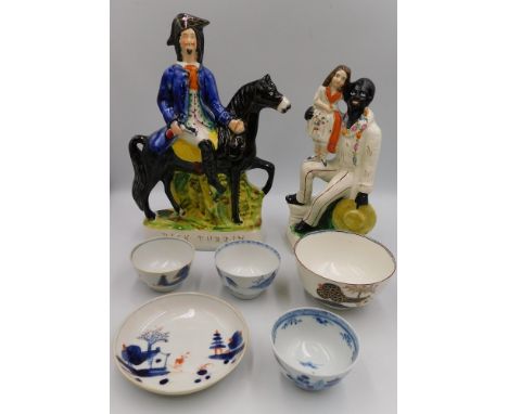 A collection of 18th Century tea bowls with saucers along with two Staffordshire figures of uncle Tom with Eva and Dick Turpi