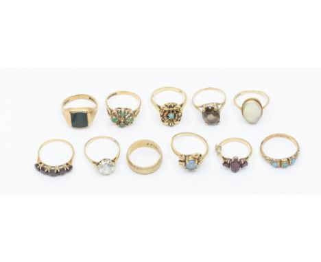 A collection of stone set 9ct gold rings to include a fancy turquoise and garnet cluster, size Q1/2, emerald cluster, size R,