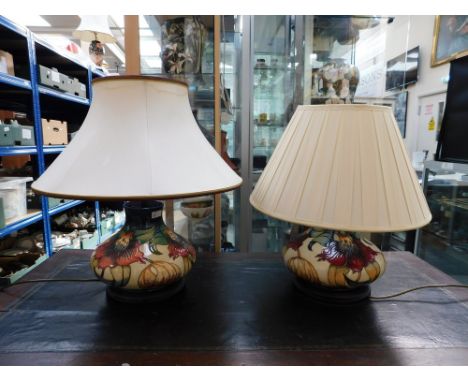 2 Moorcroft Squat shaped lamps in the Anna Lilly design by Emma Bossons, both with shades ,1 lamp is first quality , the othe