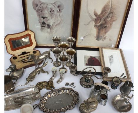 A collection of silver plated items to include animal figures, goblets, candlestick, money box, tankards along with four fram