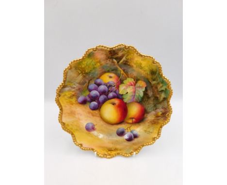 A Royal Worcester Rope edged plate , with hand painted fruits and gilt edge , approximate diameter 22.5cm, signed by artist T