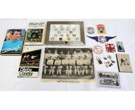 A collection of Derby County pin badges, cloth patch badges, league colours silk patch, framed Derby County badges, three boo