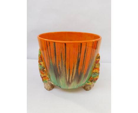 A 1930s Clarice Cliff Wilkinson Ltd table planter in the My Garden range, burnt orange, green and browns, has a re glued chip