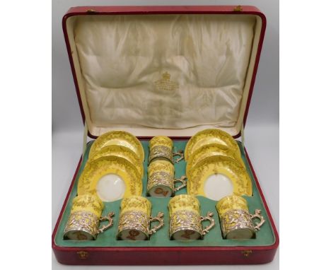 A cased set of late Victorian Crown Staffordshire coffee cans and saucers, in yellow ground with gilt, each can having late V