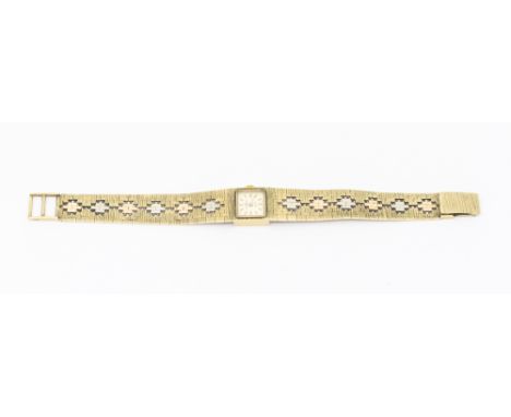 A vintage JW Benson ladies tri-colour 9ct gold bracelet watch, comprising a square signed silvered dial, with baton markers, 