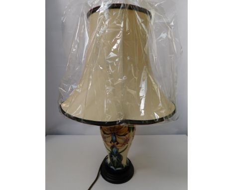 A Moorcroft lamp in the Sweet Lily design by Rachel Bishop with shade, ceramic portion approximate height 25.5cm , 1st Qualit