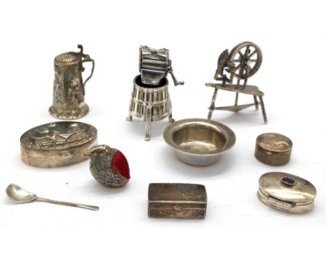 A collection of miniature silver items to include; a Modern silver small pin cushion in the form of a chick, hallmarked by Ar