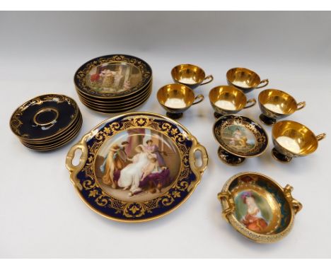 A Vienna porcelain part tea service consisting of six cups and saucers; six plates; twin handled serving plate and a small co