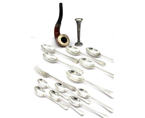 A collection of silver comprising; a set of six George V silver dessert spoons, hallmarked by CW Fletcher, Sheffield, 1927; a