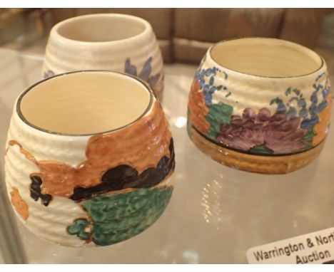 Three Clarice Cliff Bizarre honey pot condiment bowls CONDITION REPORT: No visible damage or restoration.