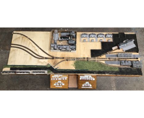 N Gauge end to end model railway layout includes ten motorised points / control panel and eighteen card kit built buildings C