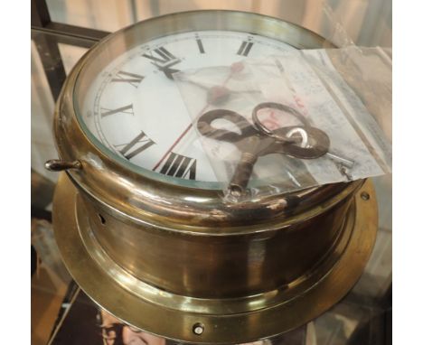 Smiths Cricklewood WWII ships brass clock with keys CONDITION REPORT: This item is working at lotting