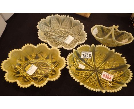 Four pieces of Victorian yellow glass including a glass basket by Davidson registration number 176566 Lady Chippendale design