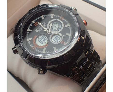 New and boxed Barkers of Kensington gents Mega Sport wristwatch on ceramic bracelet CONDITION REPORT: This item is working at
