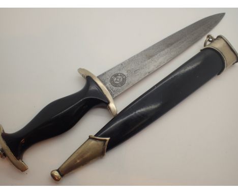SS dagger with engraved blade CONDITION REPORT: This item is most likely a 1960s replica