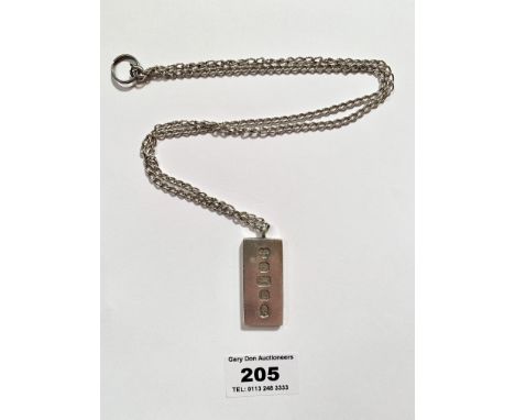 Silver ingot on silver chain. Length of chain 24” (31cm) and length of ingot 1.5” (3.5cm). Total w: 1.37 tozs