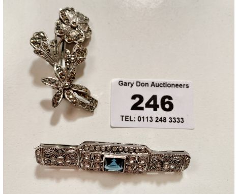 1 silver bar brooch and 1 dress flower brooch