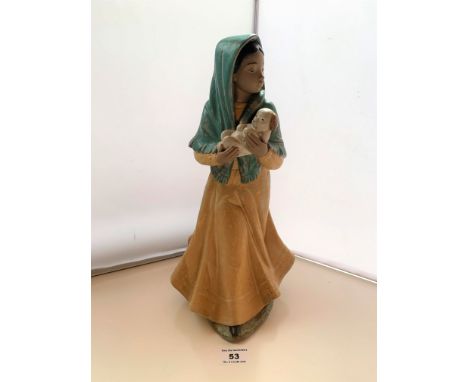 Nao figure of woman with puppy, 13.5” (34cm) high.  Matt finish, distressed look. No damage