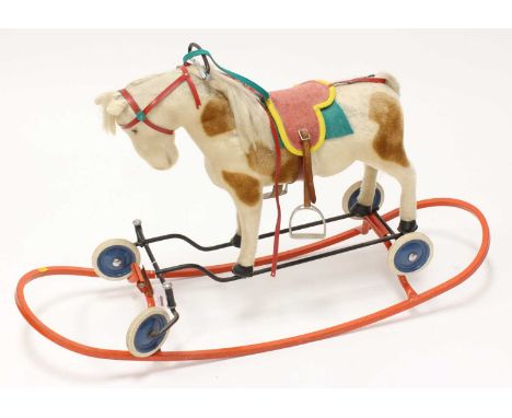 Steiff Riding/Rocking Horse on wheels, German, mid-20th century example comprising cream fur with brown spots, missing Steiff