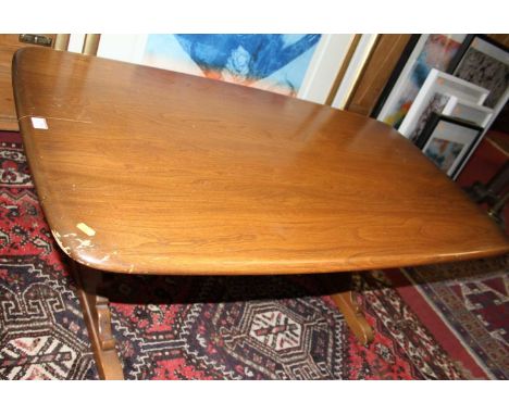 An Ercol mid-elm 'Golden Dawn' round cornered coffee table, length 129cm