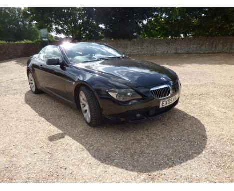 BMW 645 CI black convertible automatic with black leather seats and MOT till October 2016, 77184 miles.  Damage to passenger 