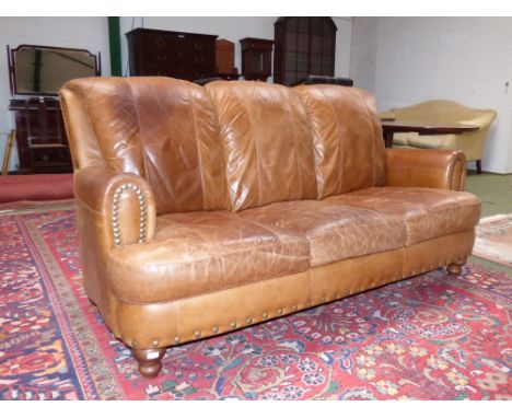 Modern light brown leather 3 seater sofa, 68x177cm