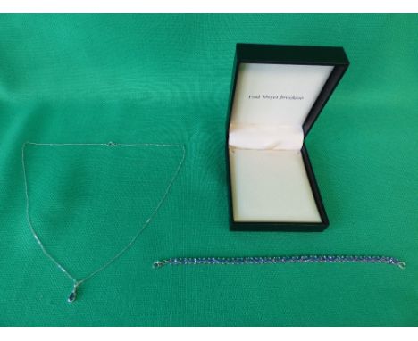 9 ct white gold bracelet, set with light blue stones, and a 9ct gold white necklace, with pendant 