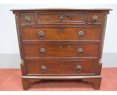 An XVIII Century Mahogany Chest of Drawers, the top with moulded edge over two small drawers and central drawer with leathere