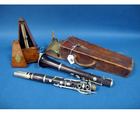 An Early XX Century Hawkes & Son "Senorous Class" Rosewood Clarinet, No. 4164, leather case; A Maelzel Rosewood Case Metronom