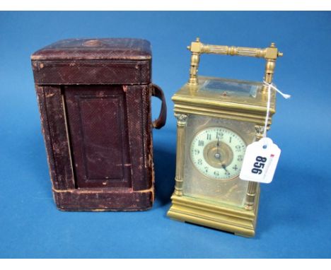 An Early XX Century Carriage Clock, the repeater movement striking on a coiled gong, the engraved mask with enamel chapter ri