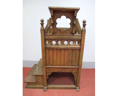 A XIX Century Pitch Pine Pulpit, the stile posts with finial tops, sloping desk with supports on square chamfered legs united