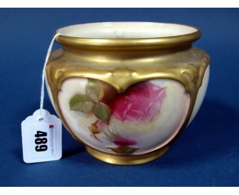 A Royal Worcester Porcelain Jardiniére, painted in panels with pink roses within gilt borders, printed mark in puce, shape nu