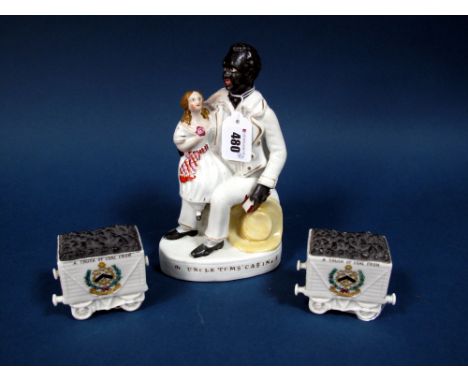 A Mid XIX Century Staffordshire Pottery Flatback Figure "Uncle Tom's Cabin", the seated figure holding a book, a girl on his 