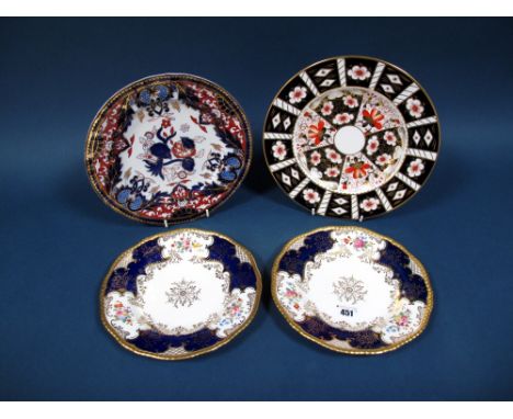 A Pair of Early XX Century Coalport Porcelain Plates, decorated in the blue Bat Wing pattern with gadrooned borders, printed 