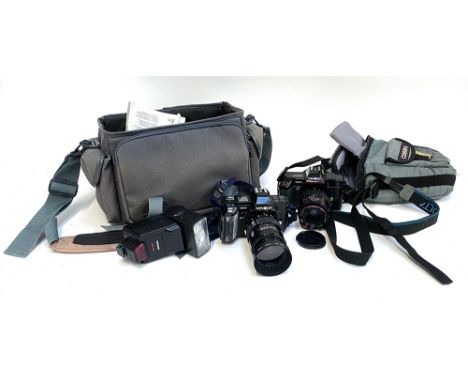 A Minolta 5000 35mm camera, with 28-70mm lens, together with a camera bag containing a Minolta 7000 with 28-80mm lens, flash 