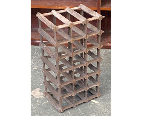 A vintage 18 bottle wine rack