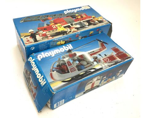 A Playmobil hook and ladder fire engine, model 3781, boxed, together with a white rescue helicopter, model 3789, boxed