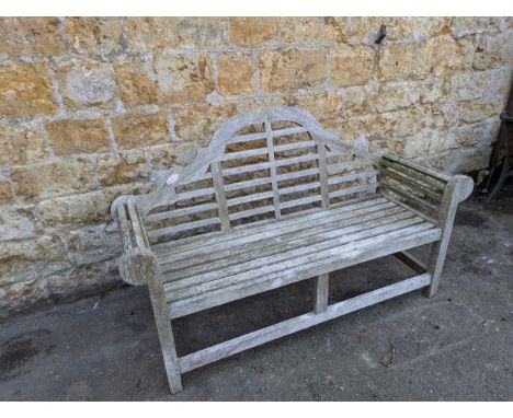 A teak Lutyens style bench, 161cmW