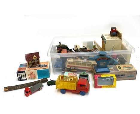 A box of vintage toys to include tanks, vehicles, rubix cubes, and two small bags of plastic figures &amp; animals, Lesley ma