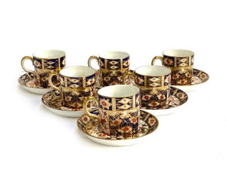 A set of six Royal Crown Derby coffee cans and saucers