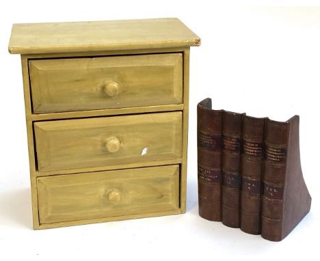 Small painted set of three drawers, 32.5cmH, together with a book trough modelled as faux leather bindings
