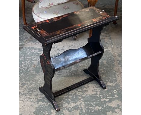 A black japanned occasional table with book trough below, 61x29x62cmH