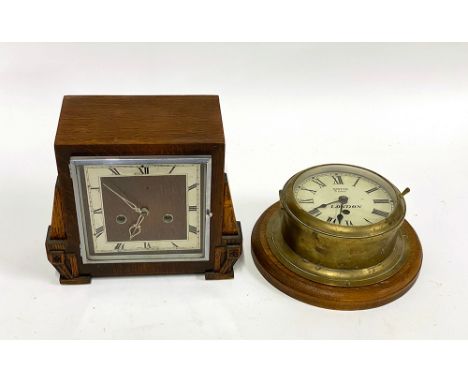 Early 20th century smiths eight day wall clock, mounted on oak plaque, with enamelled dial, together with a further art deco 