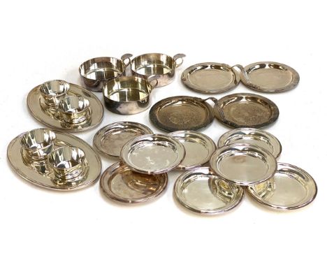 A pair silver plated Hors d'oeuvre dishes; two dip trays; eight silver plated saucers and three ashtrays