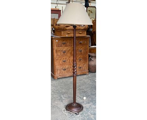 A mahogany standard lamp with spiral detail, approx. 153cm to base of fitting