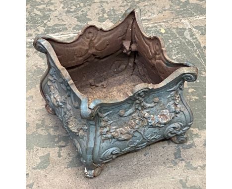 A cast iron planter, decorated with swags, 33x33x29cmH